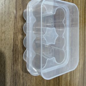 Plastic storage box holding ten 3ml vials